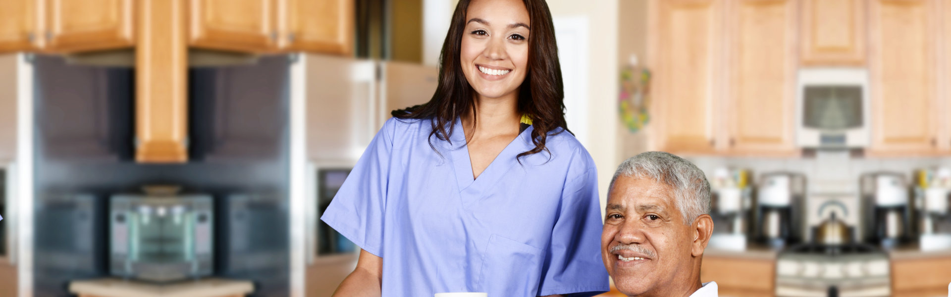 caregiver with senior smiling together