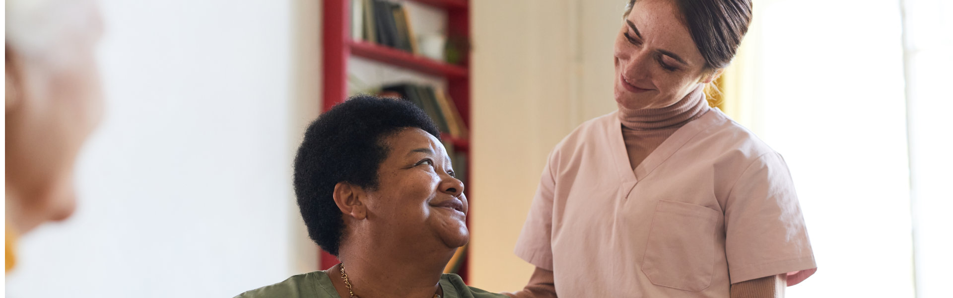 caregiver helping woman cheer up