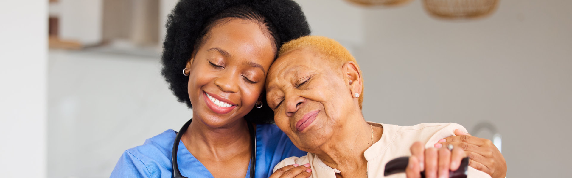 Nurse and woman patient in elderly care